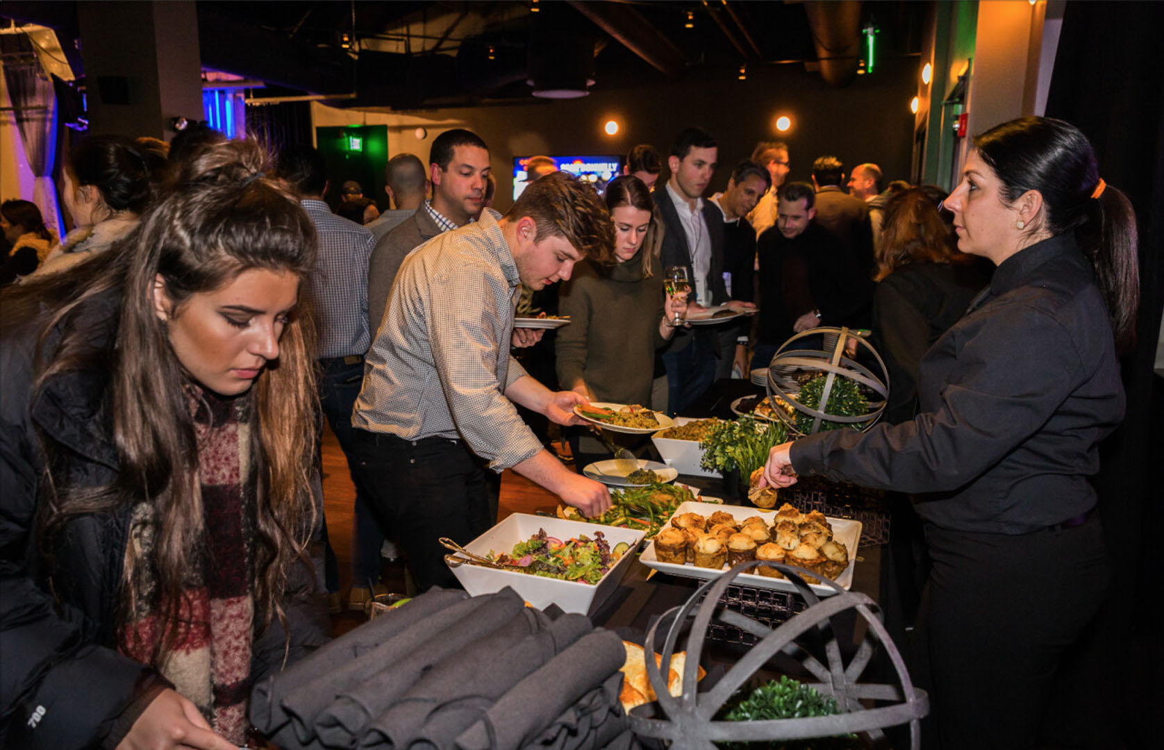 Guests enjoying a catered buffet during a private event